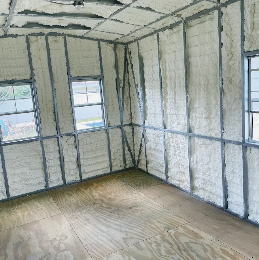 Closed-cell spray foam insulation applied to wall cavities in a residential project in North Port